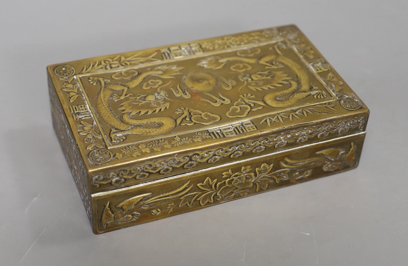 A 1920s Chinese brass 'dragon' cigarette box, 15.5cm